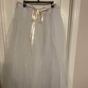 Handmade tulle skirt would be cute over some dark denim jeans and heels